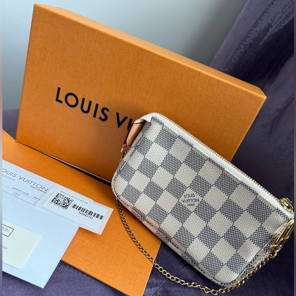 Authentic Louis Vuitton Mini Pochette Accessories.